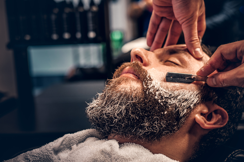 Close,Up,Image,Of,Barber,Shaving,A,Man,With,A