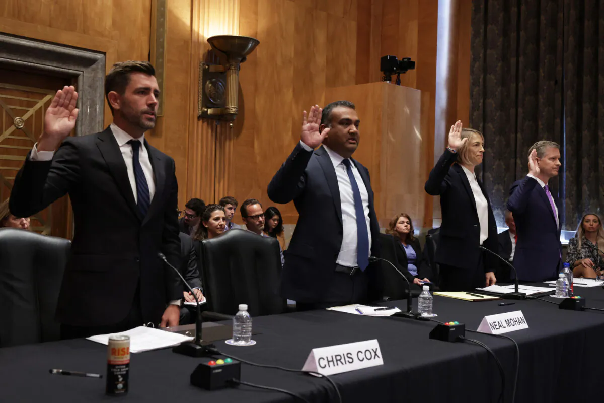 Chief Product Officer of Meta Chris Cox, Chief Product Officer of YouTube Neal Mohan, Chief Operating Officer of TikTok Vanessa Pappas, and General Manager of Bluebird of Twitter Jay Sullivan are sworn in during a hearing before Senate Homeland Security and Governmental Affairs Committee in Washington Sept. 14, 2022. (Alex Wong/Getty Images)
