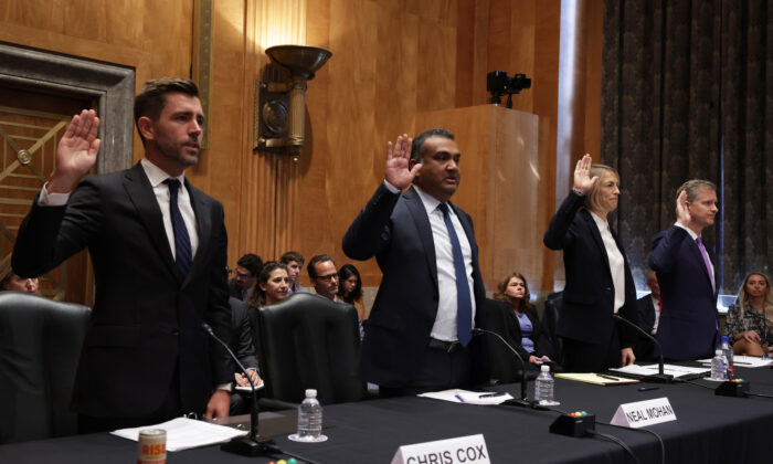 Chief Product Officer of Meta Chris Cox, Chief Product Officer of YouTube Neal Mohan, Chief Operating Officer of TikTok Vanessa Pappas, and General Manager of Bluebird of Twitter Jay Sullivan are sworn in during a hearing before Senate Homeland Security and Governmental Affairs Committee in Washington Sept. 14, 2022. (Alex Wong/Getty Images)