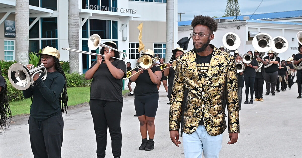 Antoine Miller, bandleader and founder of Sounds of Success Community Marching Band, preparing to perform at a fashion show in Royal Palm Beach, Fla. (Courtesy of Dreamlite Media)