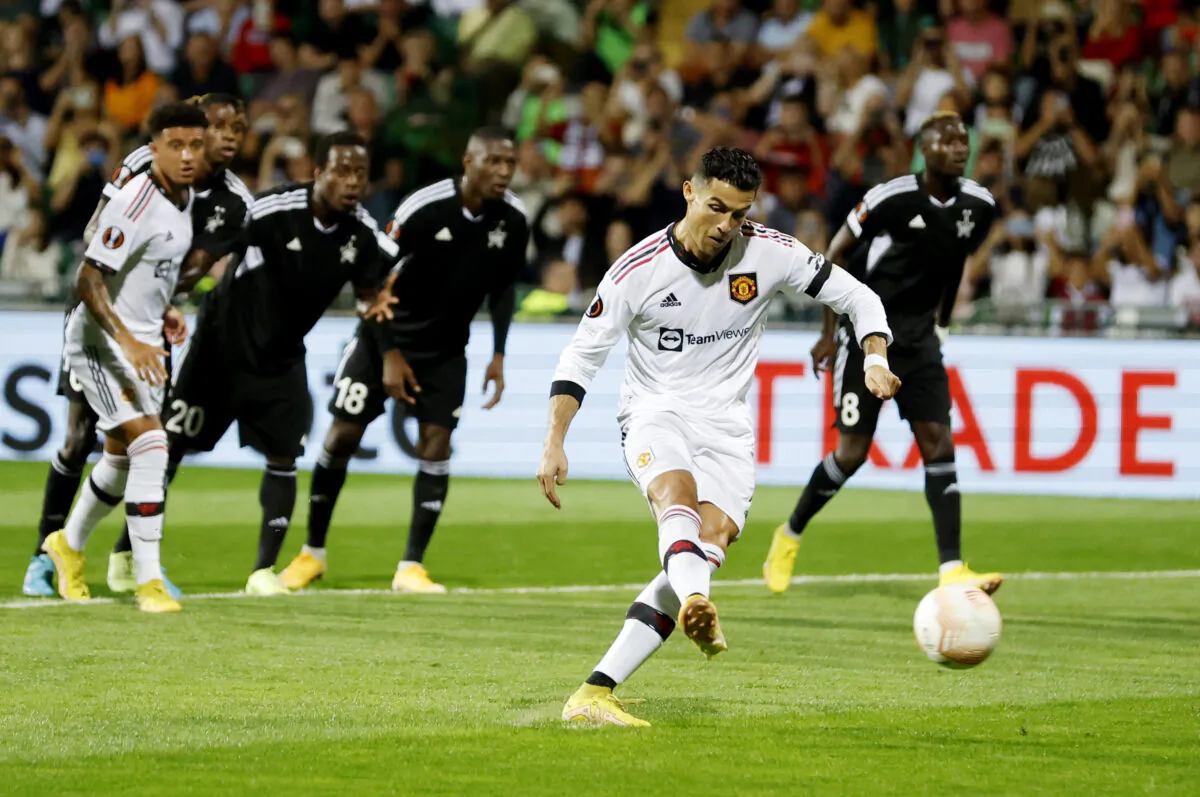 Europa League—Group E—Sheriff Tiraspol vs. Manchester United—Manchester United's Cristiano Ronaldo scores their second goal from the penalty spot, at Zimbru Stadium, Chisinau, Moldova, on Sept. 15, 2022  (Peter Cziborra/Action Images via Reuters)