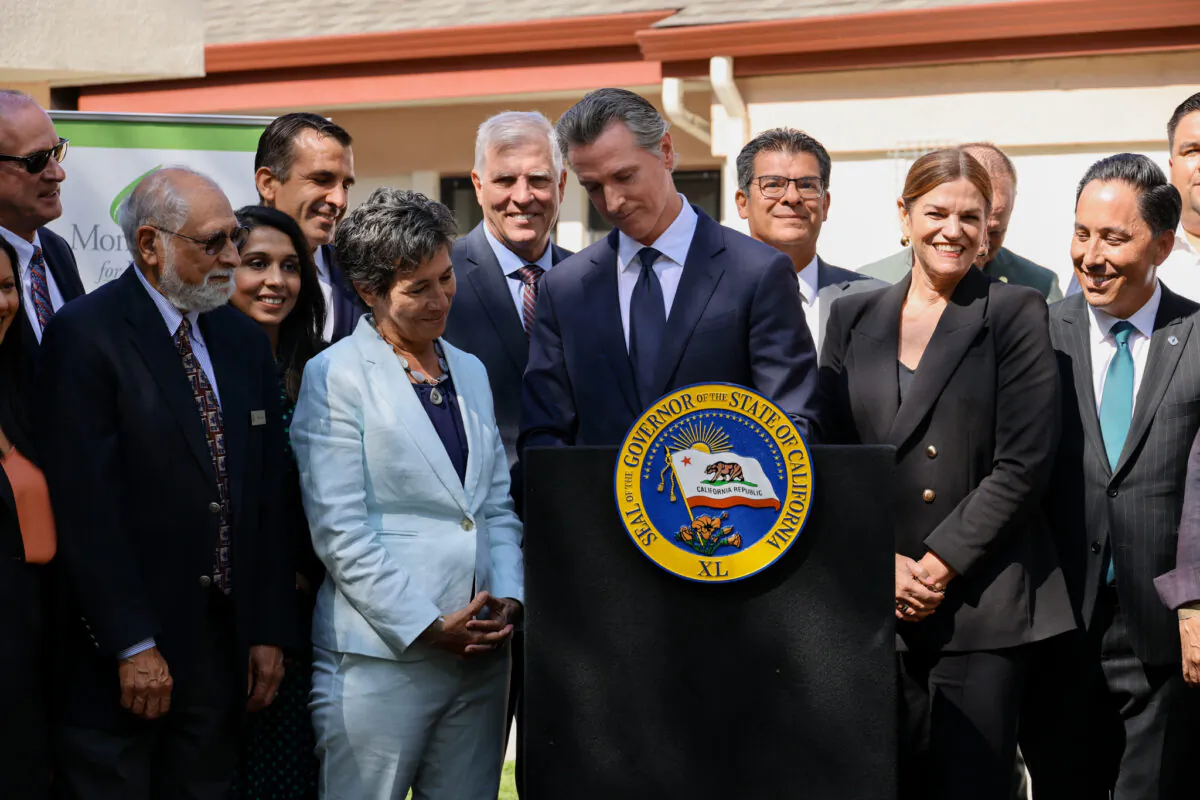 Governor Gavin Newsom signs CARE (Community Assistance, Recovery, and Empowerment) Court into law alongside state and local leaders and stakeholders in San Jose, Calif., on Sept. 14, 2022. (Courtesy of Office of Governor Gavin Newsom)