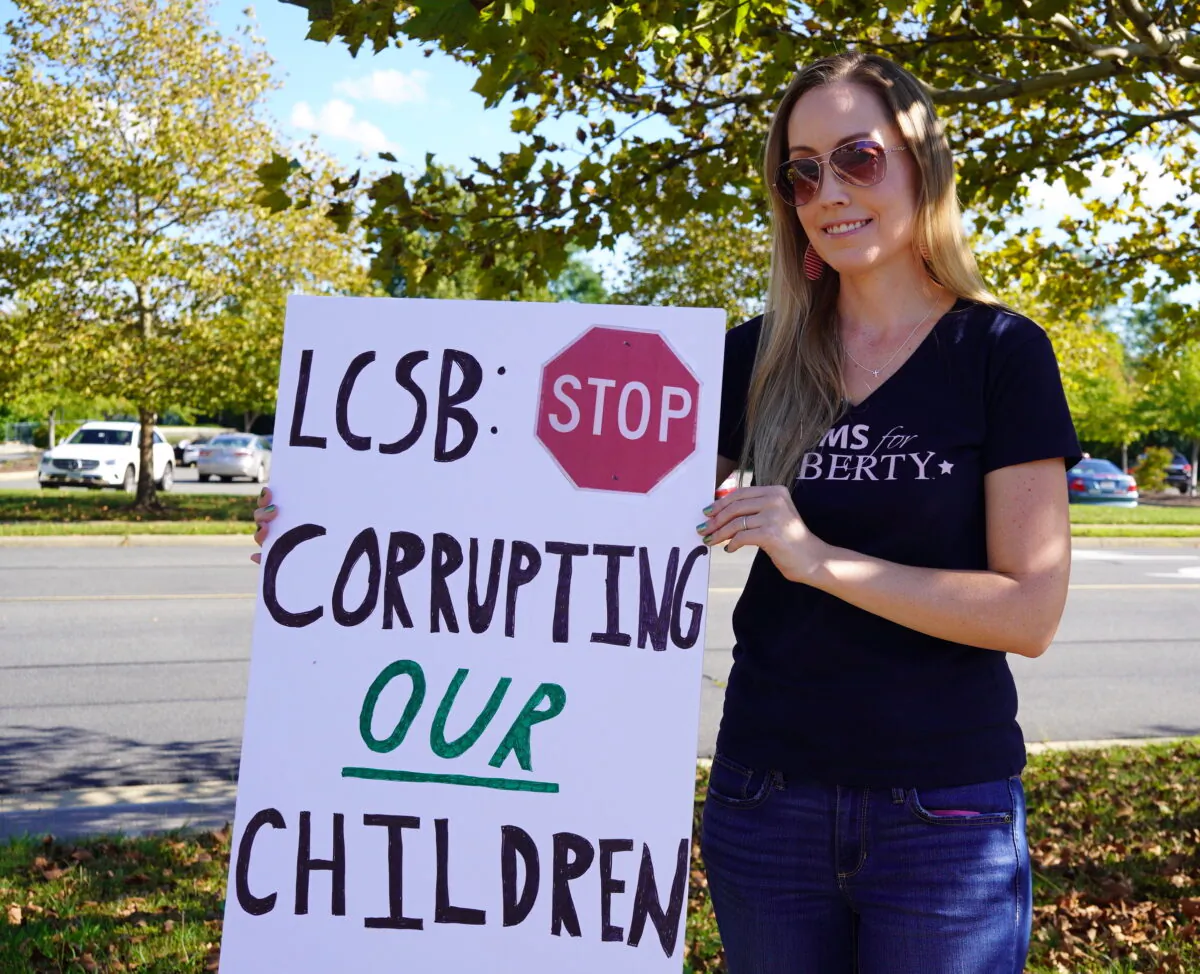 Loudoun County mother Meggan Jenkins, a member of the parental rights group Moms for Liberty, at a rally outside the Loudoun County Public Schools administration building in Ashburn, Va., on Sept. 13, 2022. (Terri Wu/The Epoch Times)