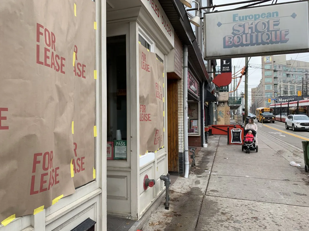 A storefront displays a "for lease" sign as part of a protest against the Ontario government's pandemic lockdown rules, on Roncesvalles Avenue in Toronto on Nov. 24, 2020. (The Canadian Press/Jody White)