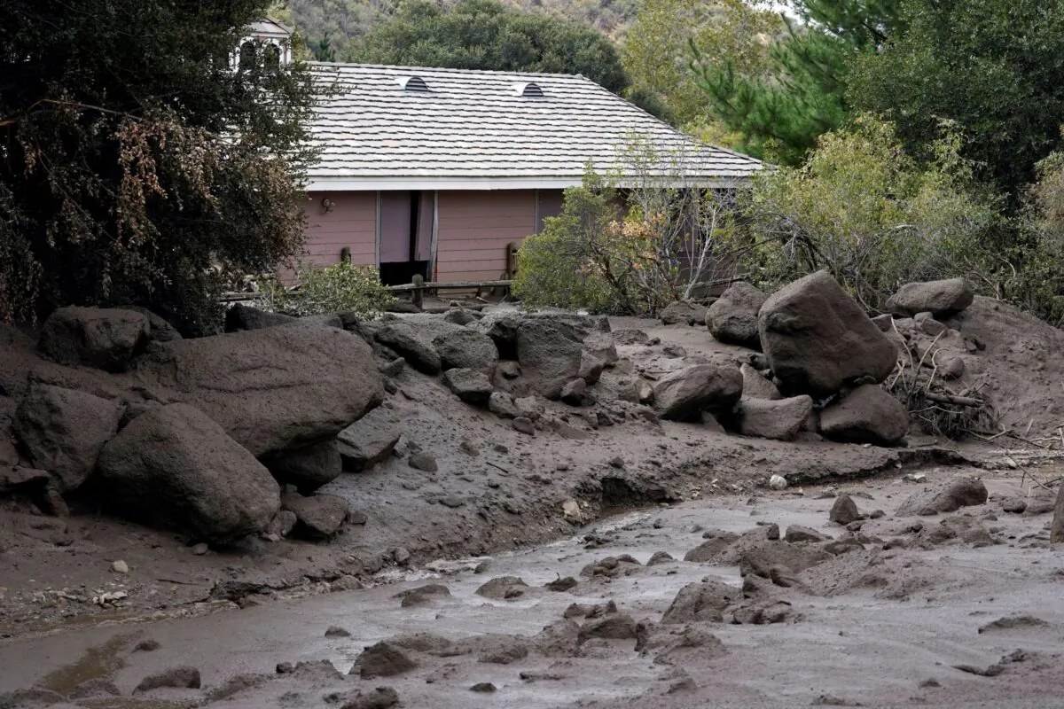 The front yard of a property is covered in mud in the aftermath of a mudslide in Oak Glen, Calif., on Sept. 13, 2022. (Marcio Jose Sanchez/AP Photo)