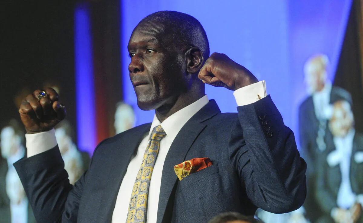 Inductee Shelby Jordan, a former linebacker from Washington University in St. Louis, is recognized during the National Football Foundation enshrinement ceremony in Atlanta, on Aug. 28, 2013. (John Amis/AP Photo)