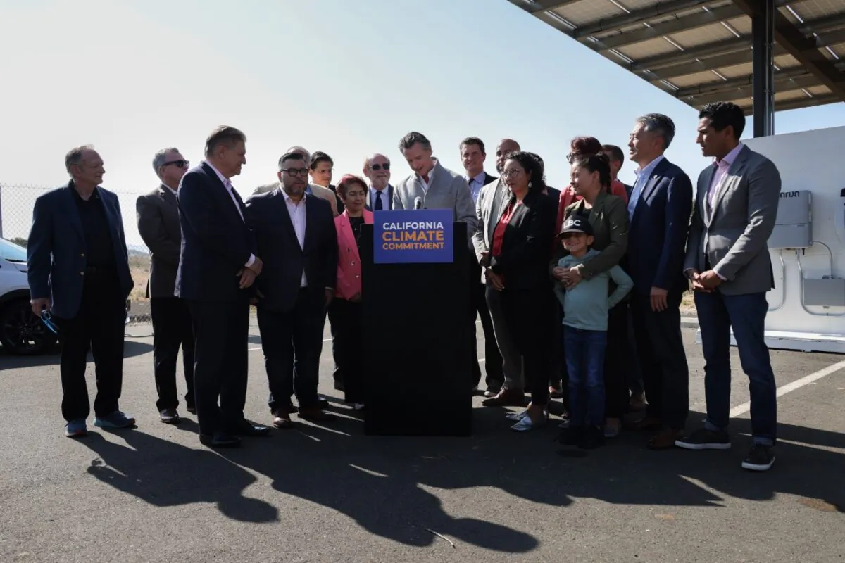 California Gov. Gavin Newsom signs several new climate bills alongside several state legislators at the U.S. Department of Agriculture Forest Service Regional Office on Mare Island, a facility powered by green energy in Vallejo, Calif., on Sept. 16, 2022. (Courtesy of the Office of Governor Gavin Newsom)