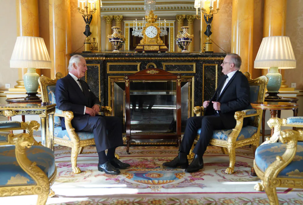 Britain's King Charles III speaks with Prime Minister of Australia, Anthony Albanese, as he receives realm prime ministers in the 1844 Room at Buckingham Palace in London, England, on Sept. 17, 2022. (Stefan Rousseau - WPA Pool/Getty Images)