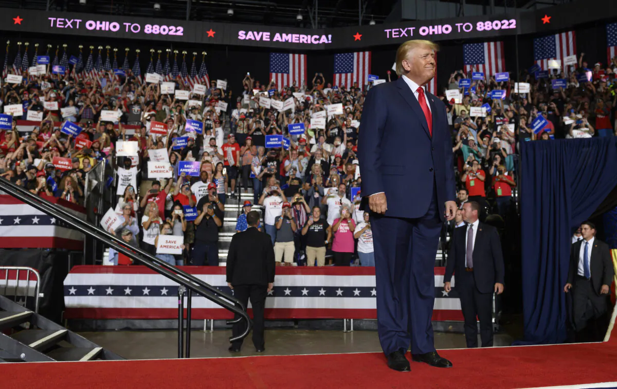 Former President Donald Trump enters the stage at a Save America Rally to support Republican candidates running for state and federal offices in the state of Ohio at the Covelli Centre in Youngstown, Ohio, on Sept. 17, 2022. (Jeff Swensen/Getty Images)