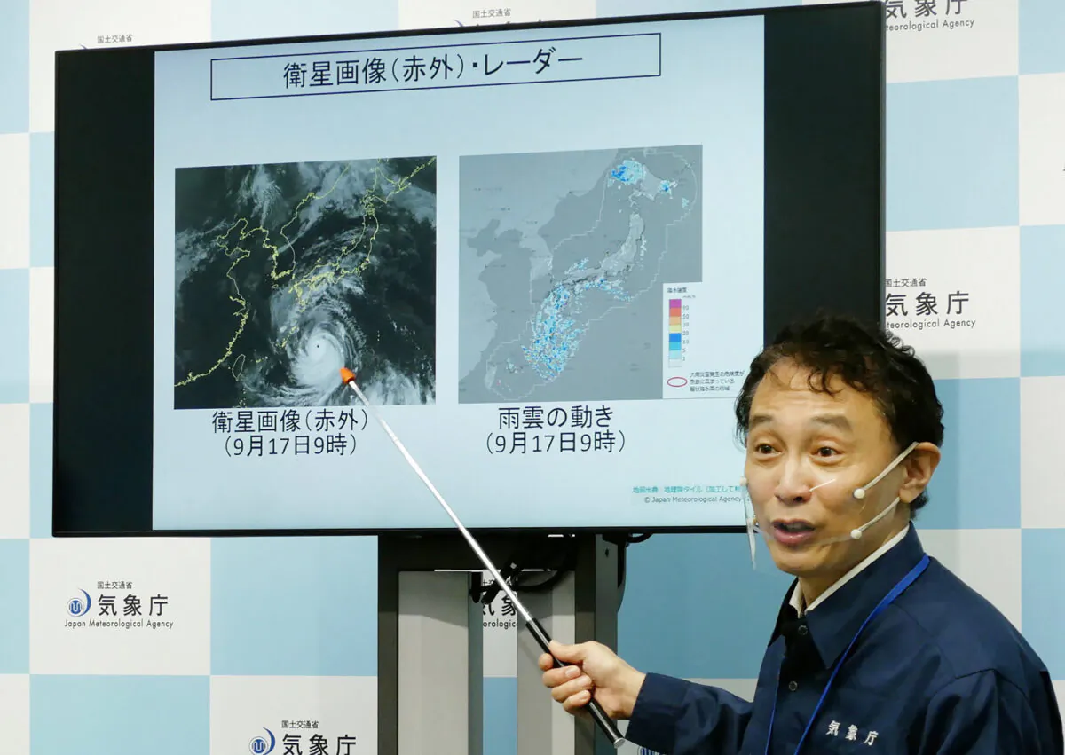 A director of the Japan Meteorological Agency's Forecast Division holds a press conference on Typhoon Nanmadol in Tokyo on Sept. 17, 2022. (STR/Jiji Press/AFP via Getty Images)