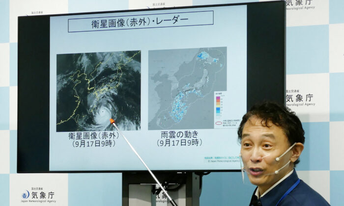 A director of the Japan Meteorological Agency's Forecast Division holds a press conference on Typhoon Nanmadol in Tokyo on Sept. 17, 2022. (STR/Jiji Press/AFP via Getty Images)