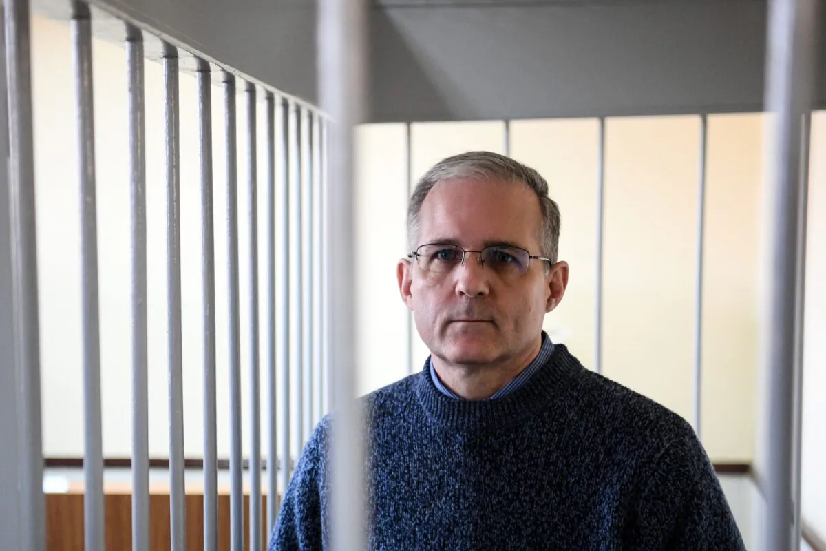 Paul Whelan, a former U.S. Marine accused of spying and arrested in Russia, stands inside a defendants' cage during a hearing at a court in Moscow, on Aug. 23, 2019. (Kirill Kudryavtsev/AFP via Getty Images)