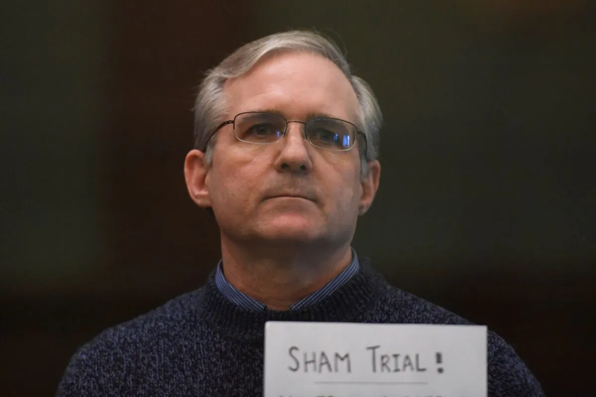 Paul Whelan, a former U.S. marine accused of espionage and arrested in Russia, in December 2018, stands inside a defendants' cage as he waits to hear his verdict in Moscow on June 15, 2020. (Kirill Kudryavtsev/AFP via Getty Images)