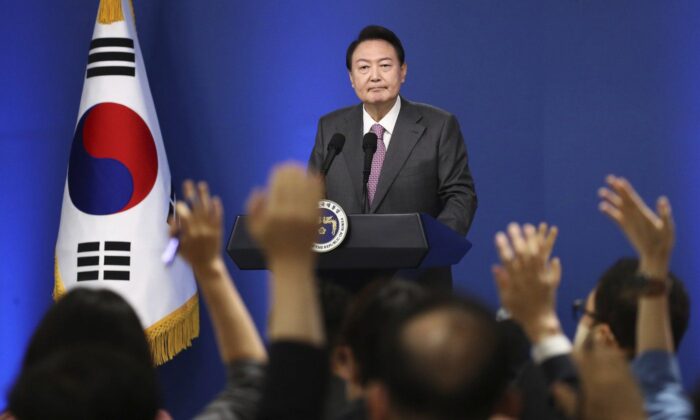 South Korean President Yoon Suk Yeol takes a question during a news conference to mark his first 100 days in office at the presidential office in Seoul, Aug. 17, 2022. (The Canadian Press/AP-POOL, Chung Sung-Jun)
