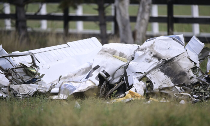 A crashed plane, one of two, lies along Niwot Road between Highway 287 and N. 95th St. in Longmont, Colo., on Sept. 17, 2022. (Andy Cross/The Denver Post via AP)