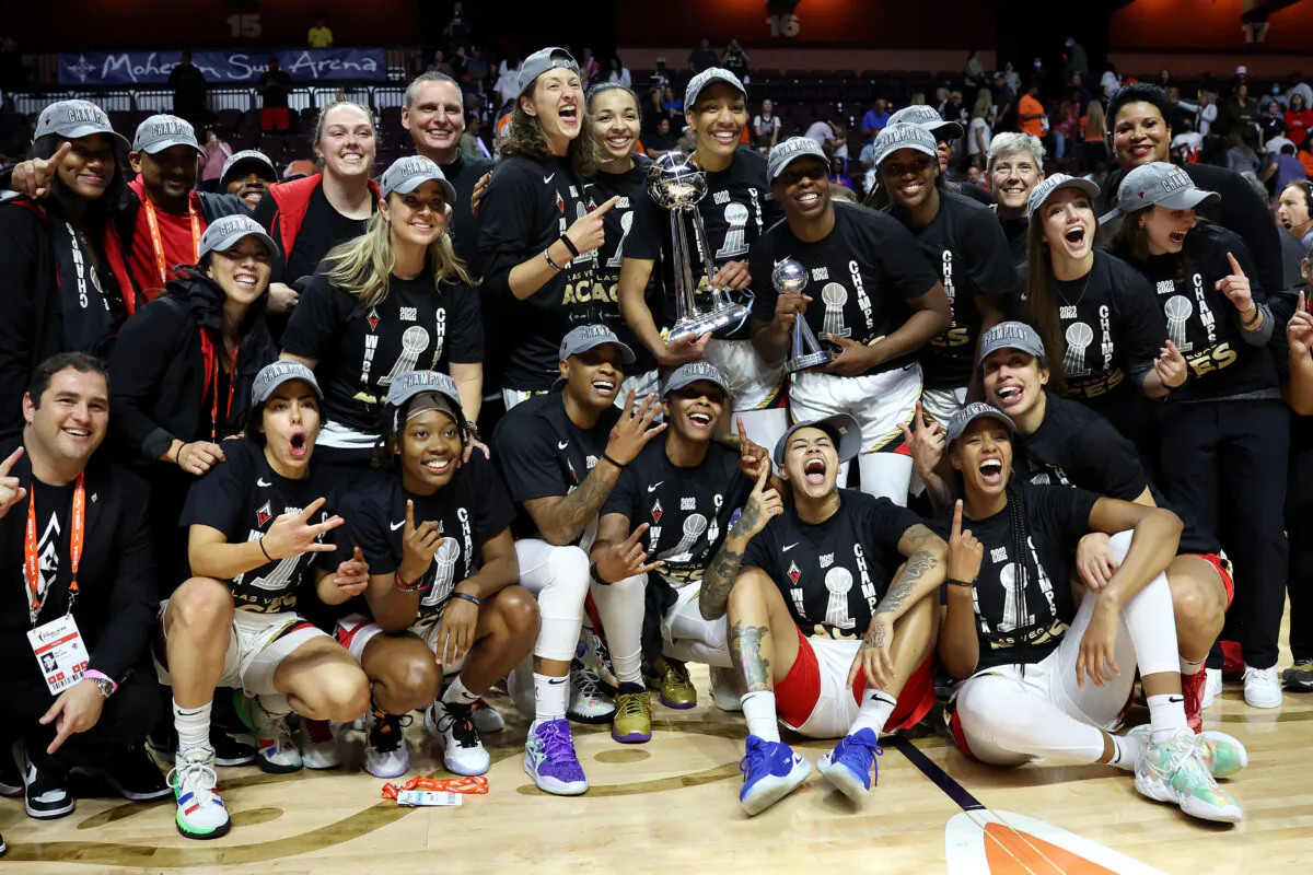 The Las Vegas Aces celebrate defeating the Connecticut Sun in game four to win the 2022 WNBA Finals at Mohegan Sun Arena in Uncasville, Conn., on Sept. 18, 2022. (Maddie Meyer/Getty Images)