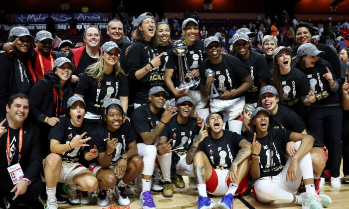 The Las Vegas Aces celebrate defeating the Connecticut Sun in game four to win the 2022 WNBA Finals at Mohegan Sun Arena in Uncasville, Conn., on Sept. 18, 2022. (Maddie Meyer/Getty Images)