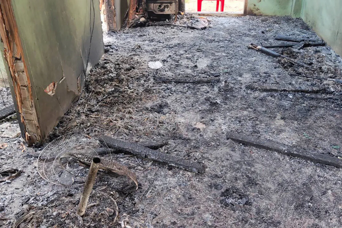 Debris and soot cover the floor of a middle school in Let Yet Kone village in Tabayin township in the Sagaing region of Burma on Sept. 17, 2022, the day after an air strike hit the school. (AP Photo)