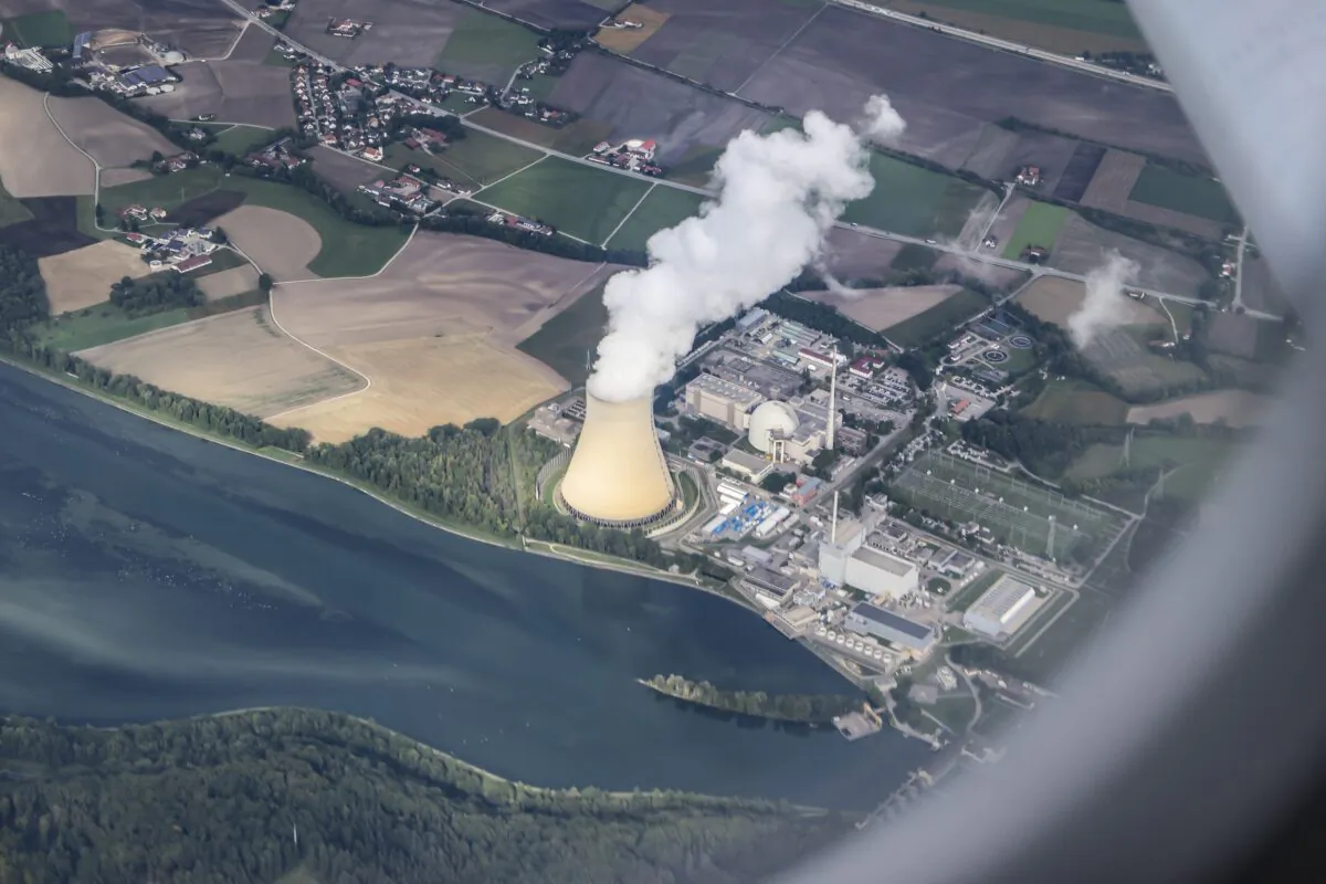 Steam gushes out of the cooling tower of the Isar 2 nuclear power plant in Essenbach, Germany, on Sept. 13, 2022. One of the last operating nuclear reactors, was shut down on April 15, 2023. (Jan Woitas/dpa via AP)