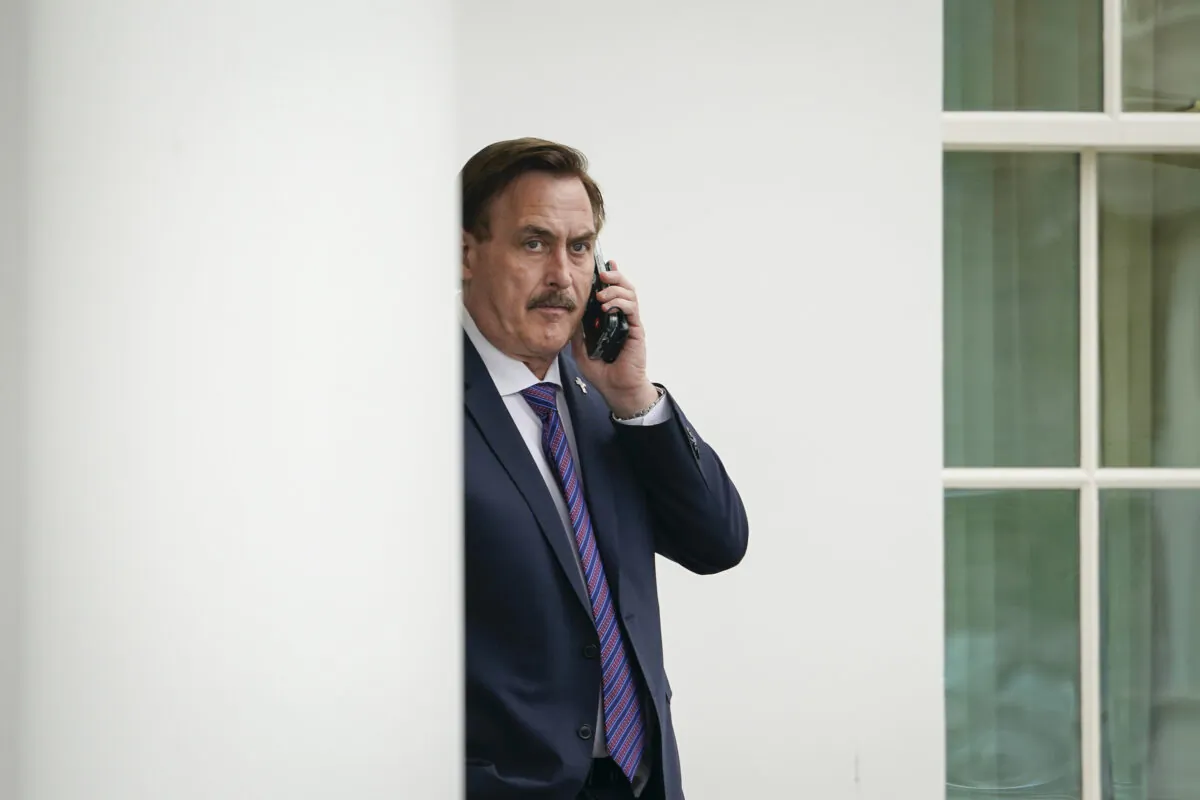 MyPillow CEO Mike Lindell waits outside the West Wing of the White House before entering in Washington, on Jan. 15, 2021. (Drew Angerer/Getty Images)