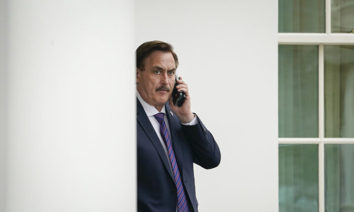 MyPillow CEO Mike Lindell waits outside the West Wing of the White House before entering in Washington, on Jan. 15, 2021. (Drew Angerer/Getty Images)