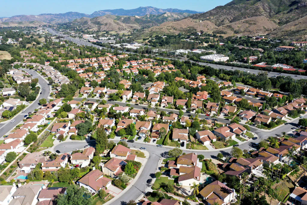 An aerial view of homes in one of the many cities in Southern California where residents will be limited to one day per week of outdoor watering in Agoura Hills, Calif., on May 6, 2022. (Mario Tama/Getty Images)