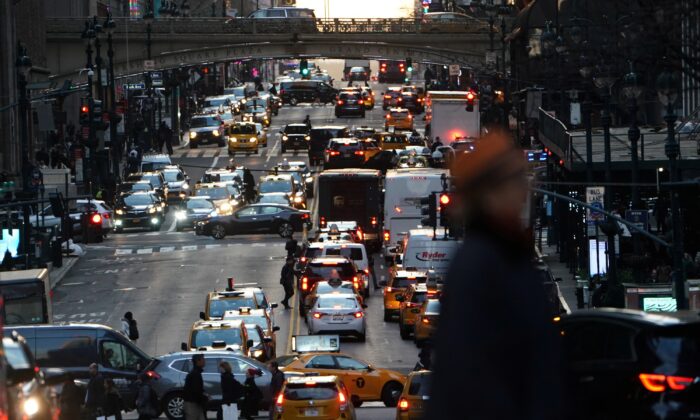 Traffic at twilight along 42nd St. in the Manhattan borough of New York on March 27, 2019. (Carlo Allegri/Reuters)