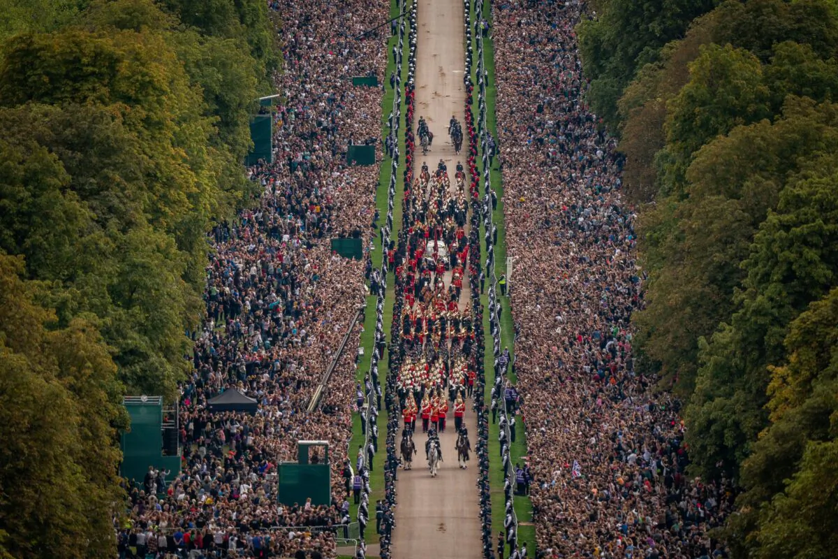 The Ceremonial Procession of the coffin of Queen Elizabeth II travels down the Long Walk as it arrives at Windsor Castle for the Committal Service at St. George's Chapel, United Kingdom, on Sept. 19, 2022. (Aaron Chown/PA Media)