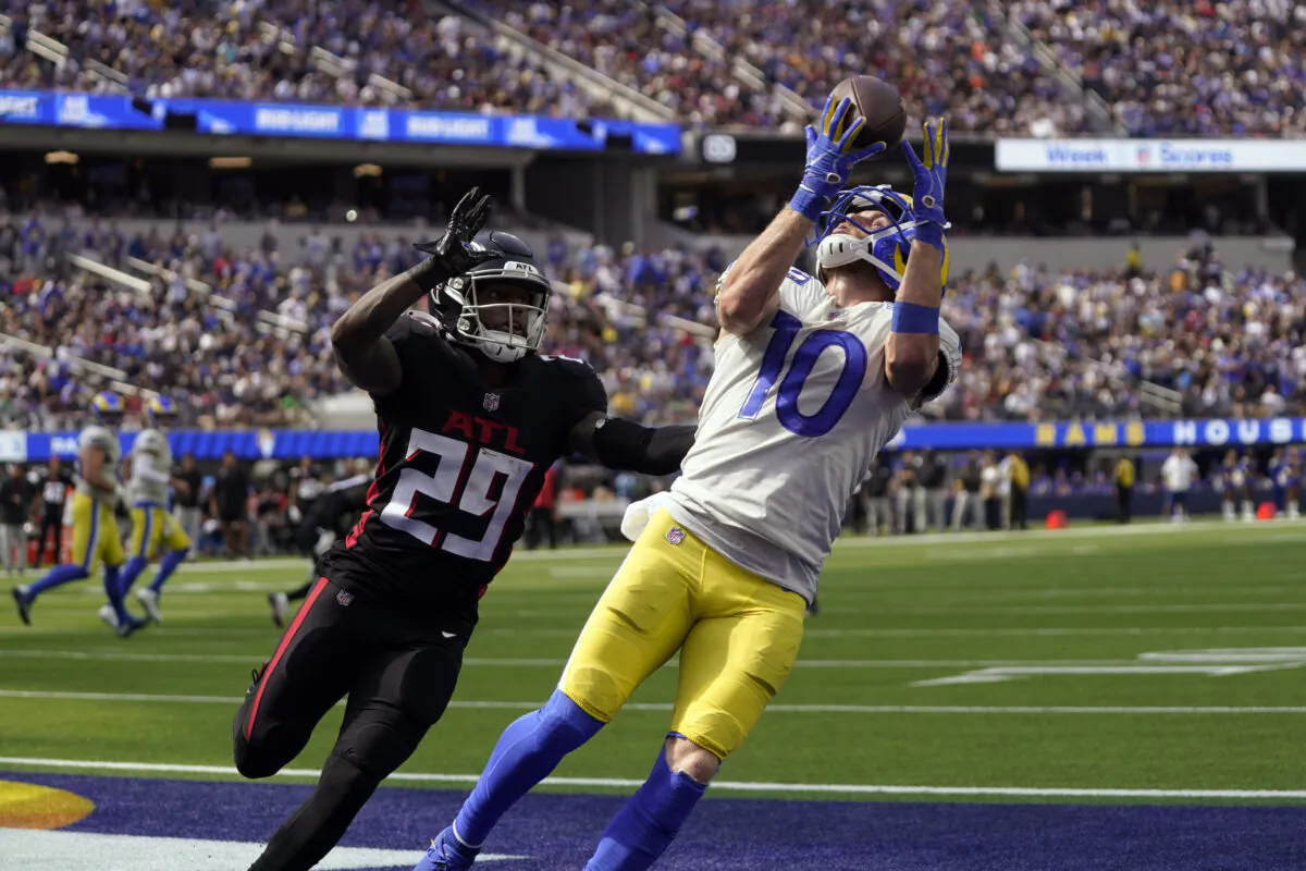 Los Angeles Rams wide receiver Cooper Kupp (10) makes a catch in the end zone for a touchdown during the first half of an NFL football game as Atlanta Falcons cornerback Casey Hayward (29) defends in Inglewood, Calif., on Sept. 18, 2022. (Mark J. Terrill/AP Photo)