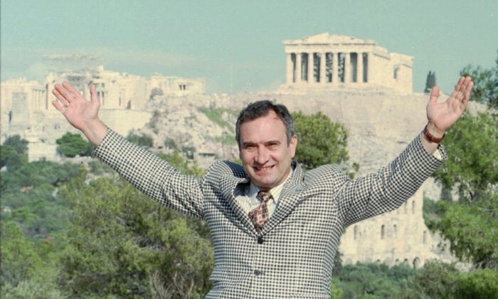 Valery V. Polyakov, the cosmonaut who set a world record for spending time in space on the MIR space station from Jan. 8, 1994 to March 22, 1995, enjoys a visit to the Philopappos Hill in Athens, Greece, on Oct. 16, 1995, with the ancient Parthenon in the background. (Aris Saris/AP Photo)