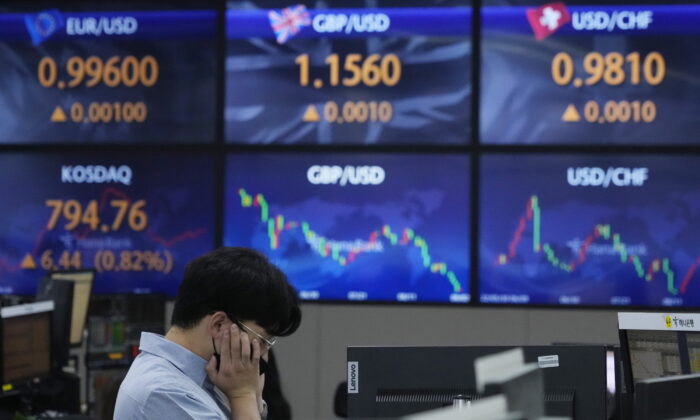 A currency trader watches monitors at the foreign exchange dealing room of the KEB Hana Bank headquarters in Seoul, South Korea, on Sept. 2, 2022. (Ahn Young-joon/AP Photo)