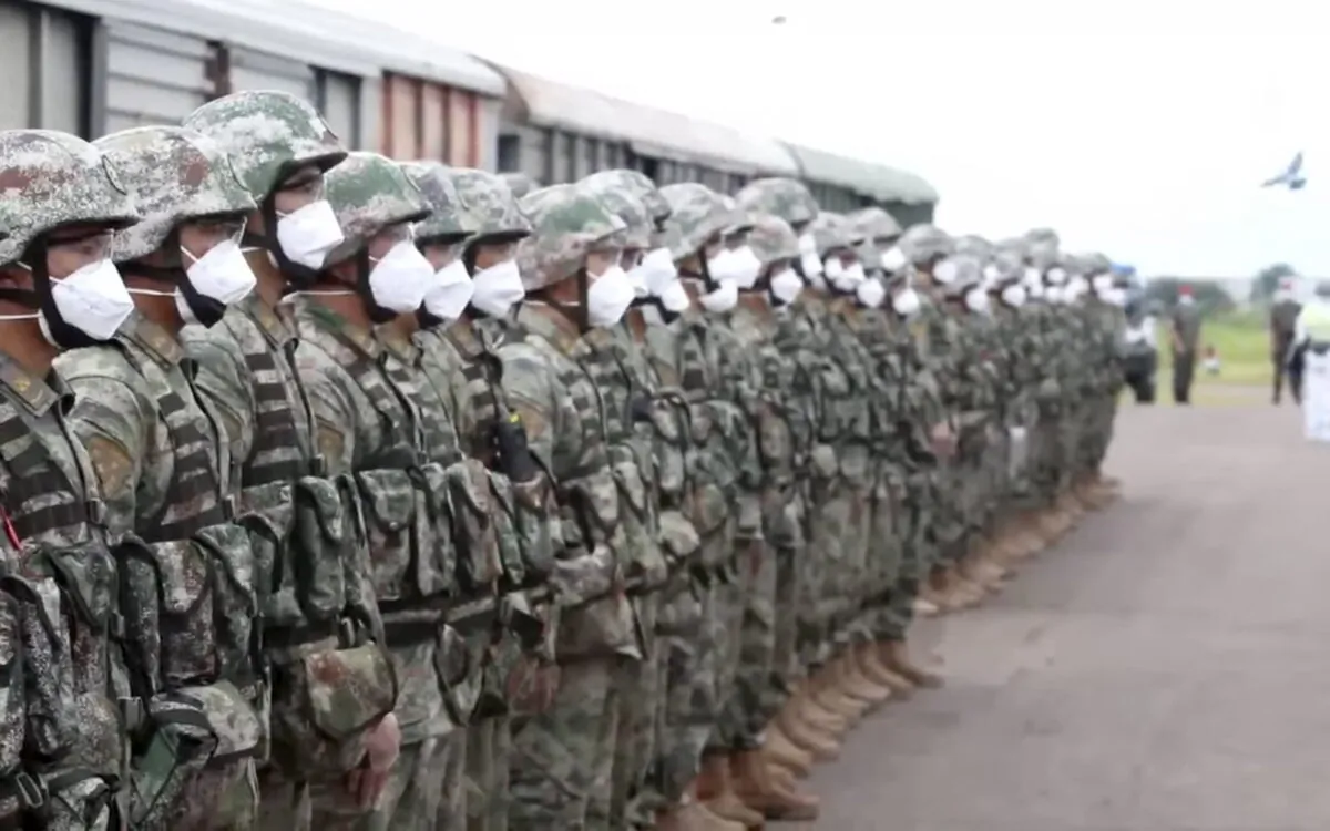 Chinese soldiers arrive to participate in war games drills in Grodekovo, Russia, in a still image from video released on Aug. 29, 2022. (Russian Defense Ministry Press Service via AP)