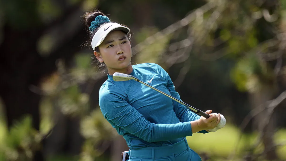 Lucy Li watches her tee shot on the second hole during the second round of the Dana Classic LPGA golf tournament Friday, Sept. 2, 2022, at the Highland Meadows Golf Club in Sylvania, Ohio, on Sept. 2, 2022. (Gene J. Puskar/AP Photo)