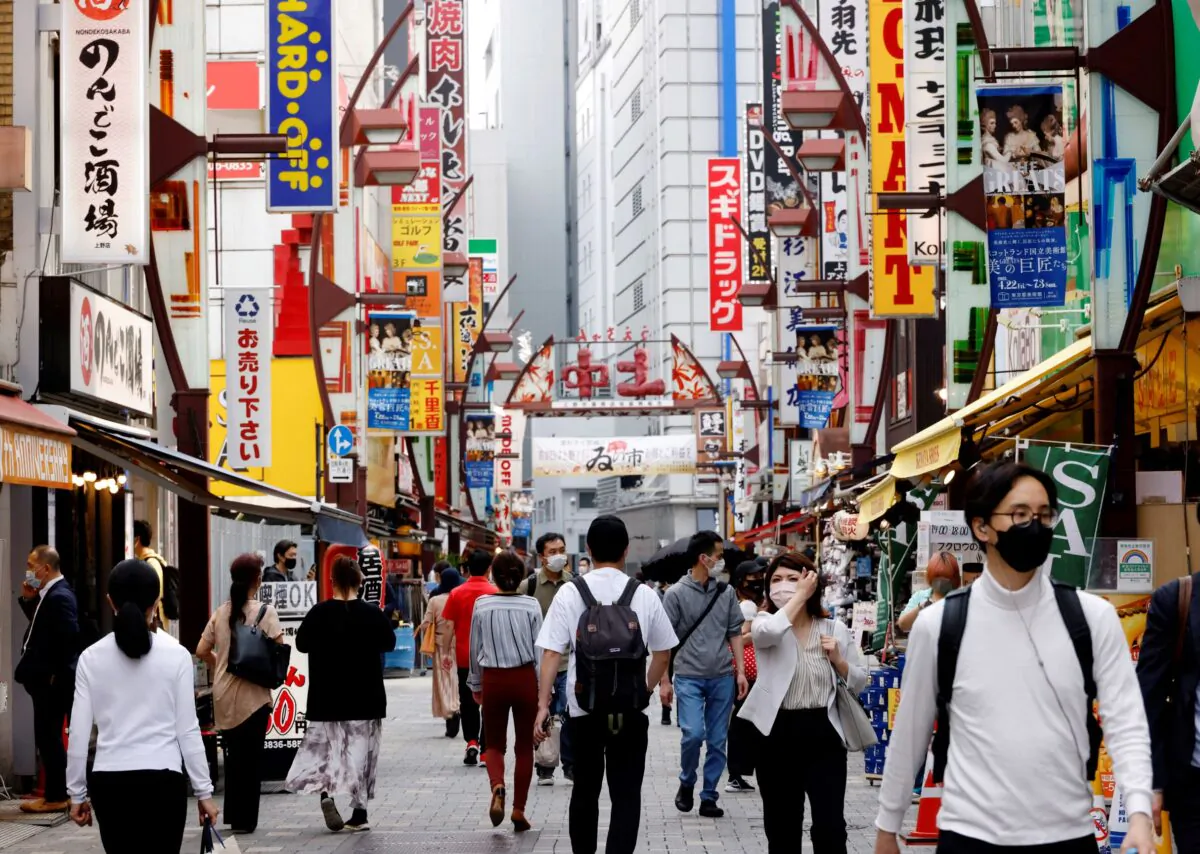People make their way at Ameyoko shopping district in Tokyo on May 20, 2022. (Kim Kyung-Hoon/Reuters)