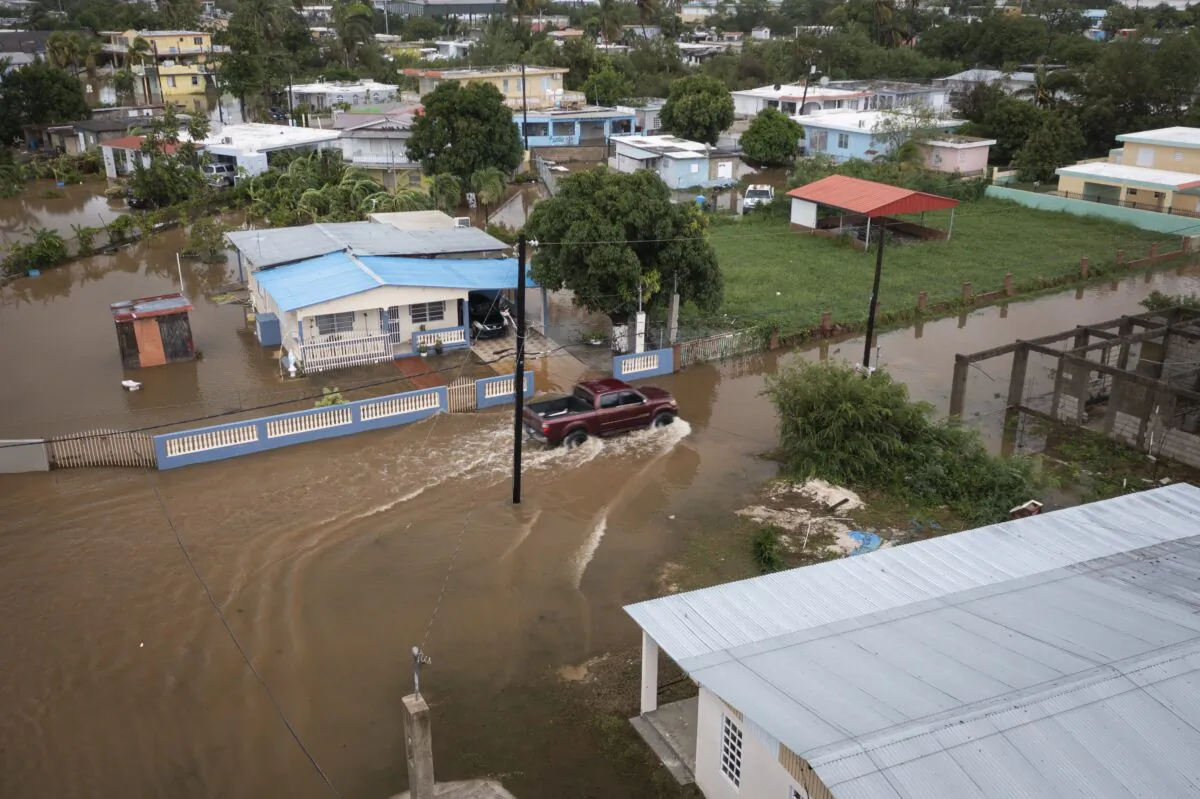 Streets are flooded on Salinas Beach after the passing of Hurricane Fiona in Salinas, Puerto Rico, on Sept. 19, 2022. (Alejandro Granadillo/AP Photo)