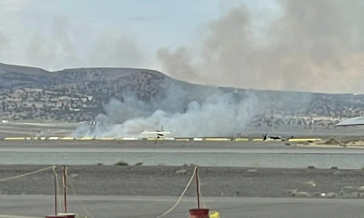 A plane crashes during the Reno Air Races in Reno, Nev., on Sept. 18, 2022. (Courtesy of @ScanningPlacer/Twitter)