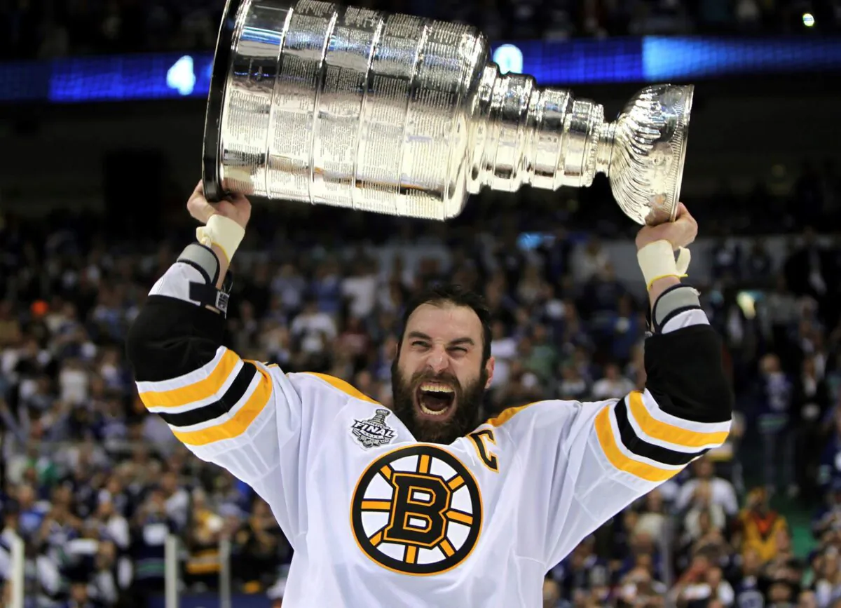 Boston Bruins' Zdeno Chara, of Slovakia, hoists the cup following the Bruins' 4-0 win over the Vancouver Canucks in Game 7 of the NHL hockey Stanley Cup Finals in Vancouver, British Columbia, on June 15, 2011. (The Canadian Press/Jonathan Hayward/AP Photo)
