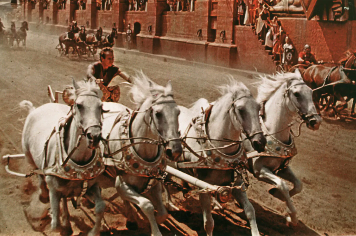 Charlton Heston as Judah Ben Hur in the chariot race that kept audiences on the edge of their seats in "Ben Hur." (MovieStillsDB)