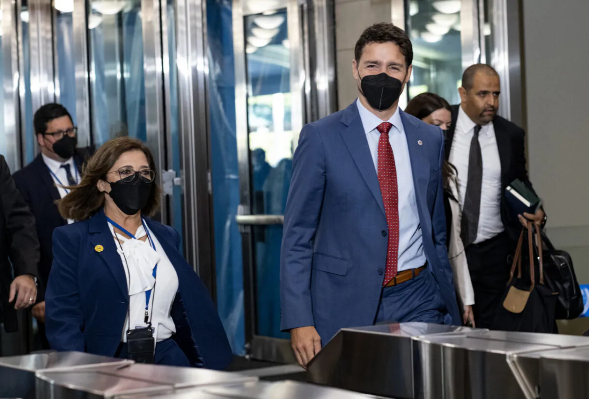 Canada's Prime Minister Justin Trudeau, right, arrives at the United Nations headquarters for the 77th United Nations General Assembly on Sept. 20, 2022. (AP Photo/Craig Ruttle)