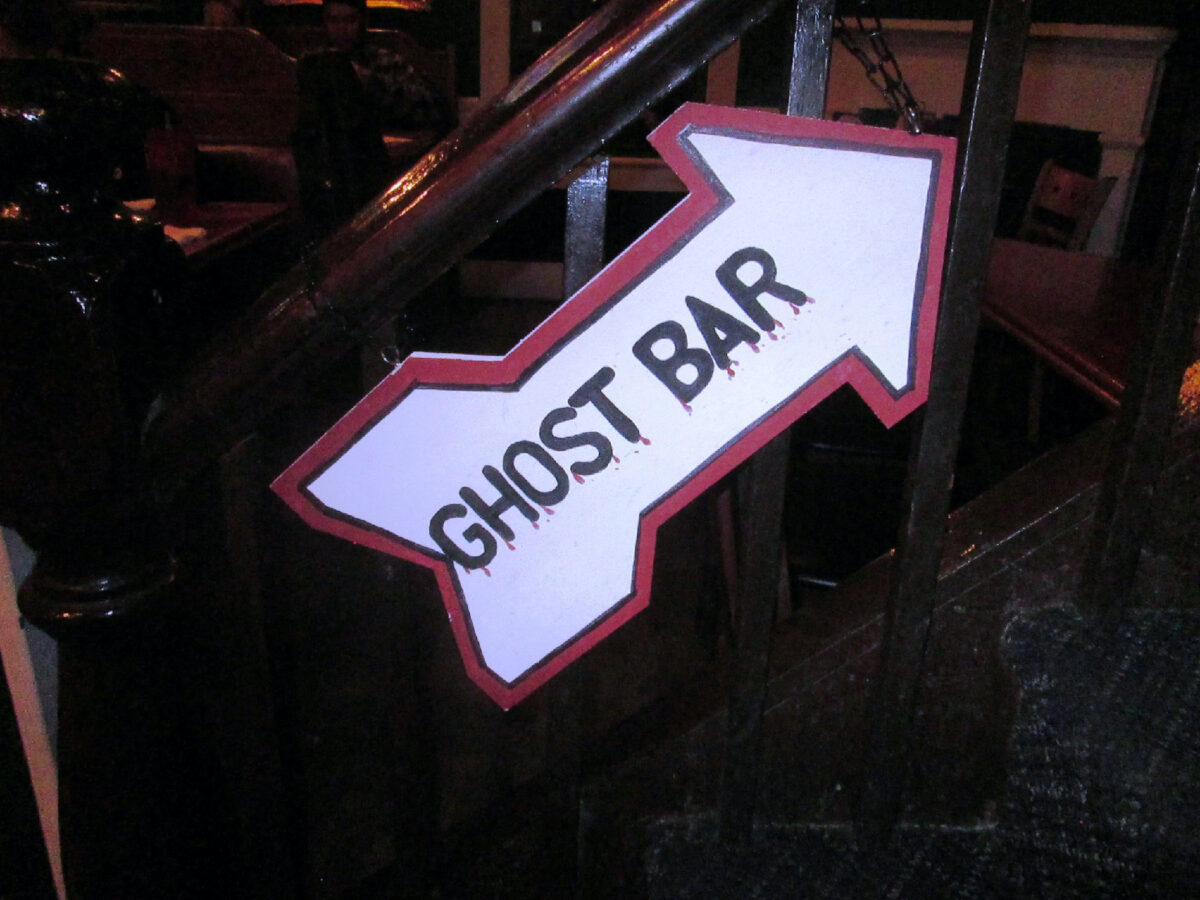 A sign directs participants in a St. Augustine, Florida, haunted pub crawl to their next destination. (Photo courtesy of Victor Block.)