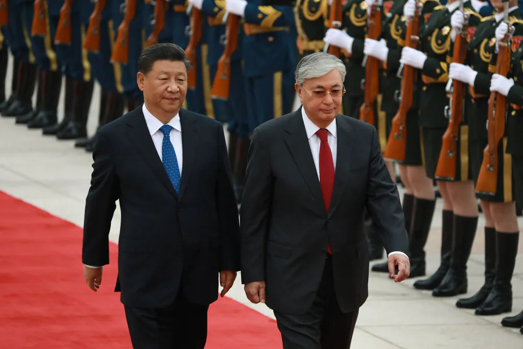 Chinese leader Xi Jinping and Kazakh President Kassym Jomart Tokayev review the Guard of Honour of the People's Liberation Army during the welcoming ceremony at the beginning of the meeting in Beijing on Sept. 11, 2019. (Andrea Verdelli/Getty Images)