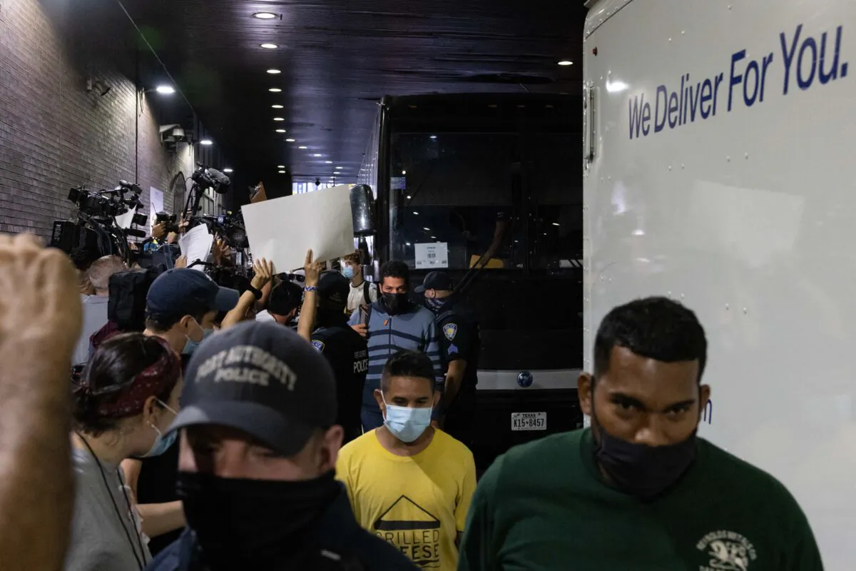 A bus carrying illegal immigrants from Texas arrives at Port Authority Bus Terminal in New York on Aug. 10, 2022. (Yuki Iwamura/AFP via Getty Images)