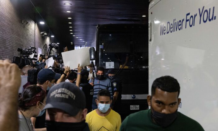 A bus carrying illegal immigrants from Texas arrives at Port Authority Bus Terminal in New York on Aug. 10, 2022. (Yuki Iwamura/AFP via Getty Images)