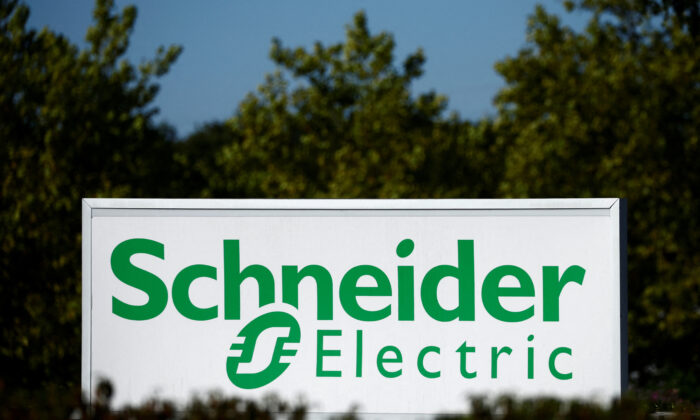 The logo of Schneider Electric outside a company building in Nantes, France, on Sept. 20, 2022. (Stephane Mahe/Reuters)