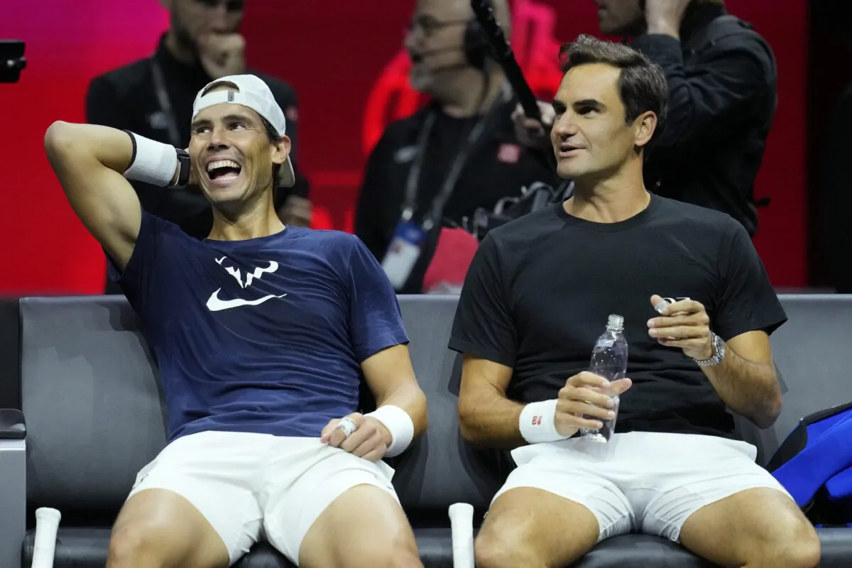 Switzerland's Roger Federer (R) and Spain's Rafael Nadal attend a training session ahead of the Laver Cup tennis tournament at the O2 in London on Sept. 22, 2022. (Kin Cheung/AP Photo)