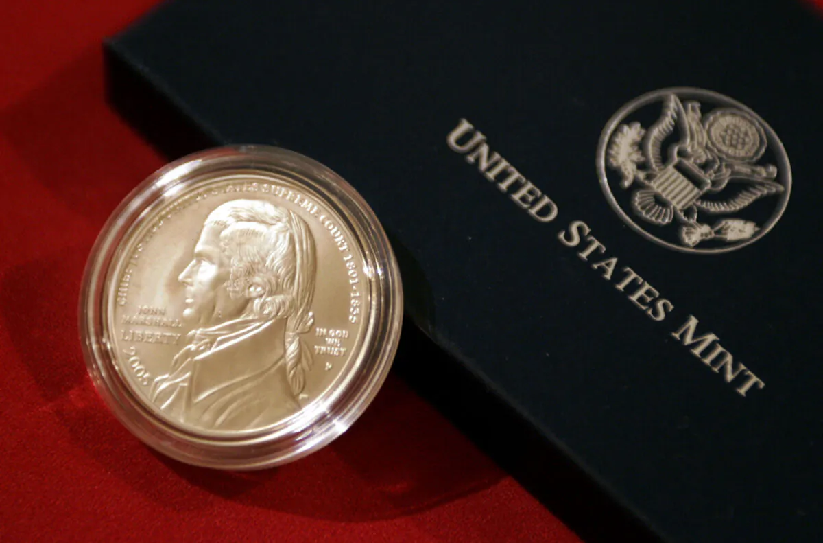 The obverse, or heads side, of the new Chief Justice John Marshall Silver Dollar, which was unveiled at the Supreme Court Upper Great Hall in Washington, D.C., on May 4, 2005. (Chip Somodevilla/Getty Images)