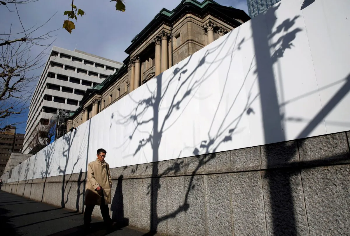 A man walks past the Bank of Japan building in Tokyo, Japan, on Jan. 15, 2018. (Kim Kyung-Hoon/Reuters)