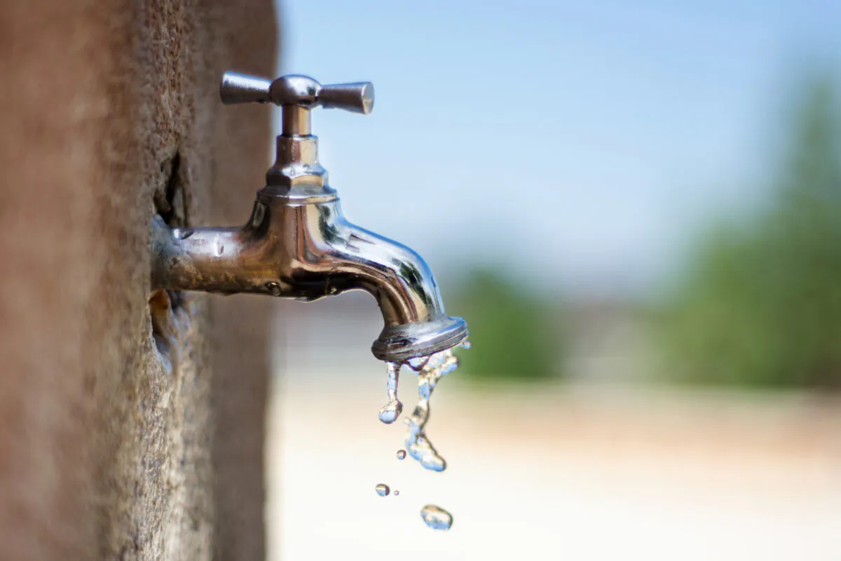 An expert says up to 63 million Americans are potentially exposed to unsafe drinking water. Upgrading the country's nearly 50-year-old lead water pipes alone will cost an estimated $60 billion. (Emmily/Shutterstock)