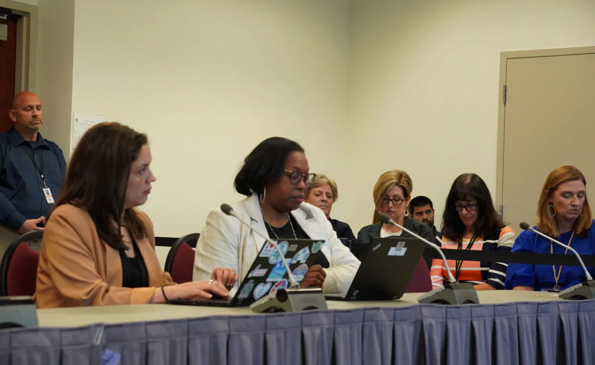 Cynthia Lewis (2nd L), Supervisor of Culturally Responsive Instruction at Loudoun County Public Schools, a Loudoun County School Board Curriculum & Instruction Committee meeting in Ashburn, Va., on Sept. 22, 2022. A new policy about parental notice of sexually explicit content in instructional materials is on the agenda. (Terri Wu/The Epoch Times)