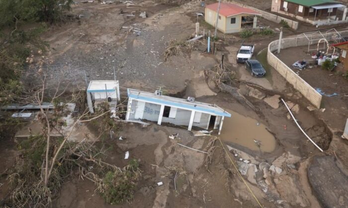 A view of a house that was washed away by Hurricane Fiona at Villa Esperanza in Salinas, Puerto Rico, is shown on Sept 21, 2022. (The Canadian Press/Alejandro Granadillo)